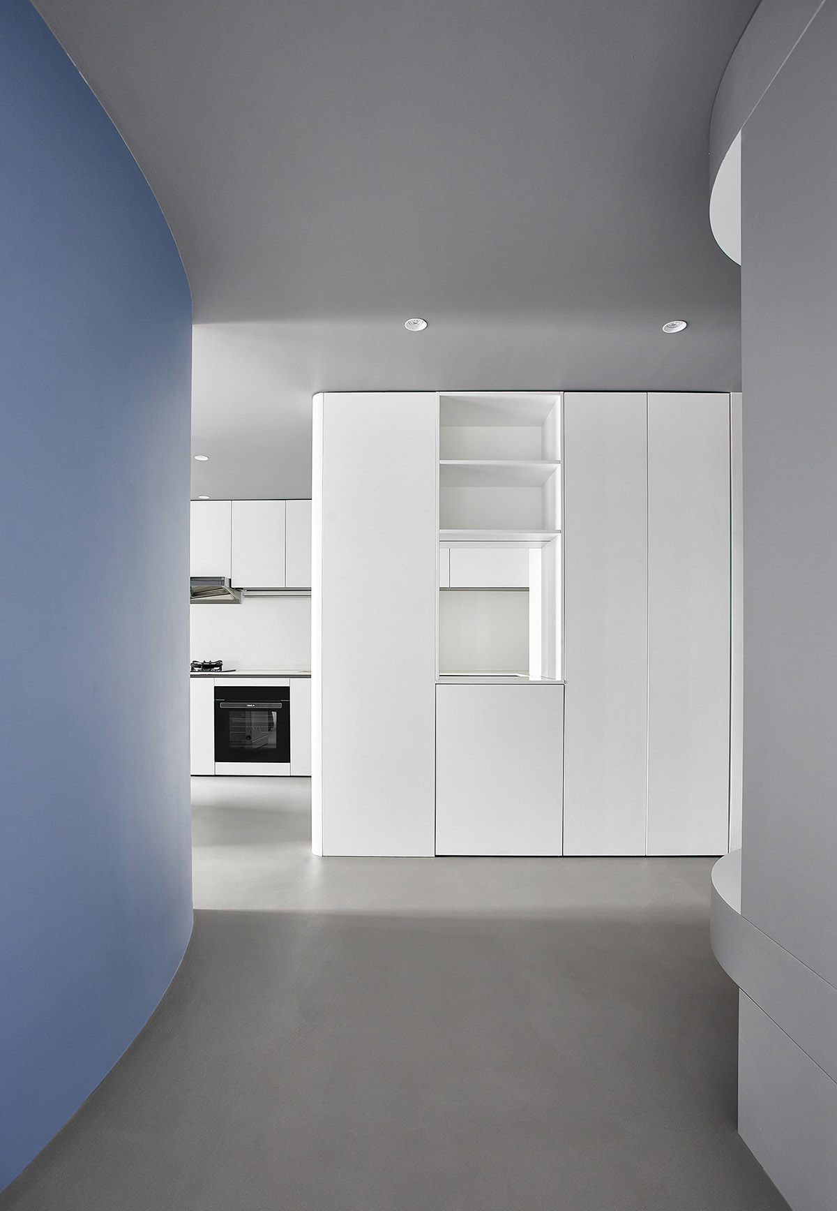 XIGO STUDIO creates gray and blue-colored interiors for apartment in Beijing 