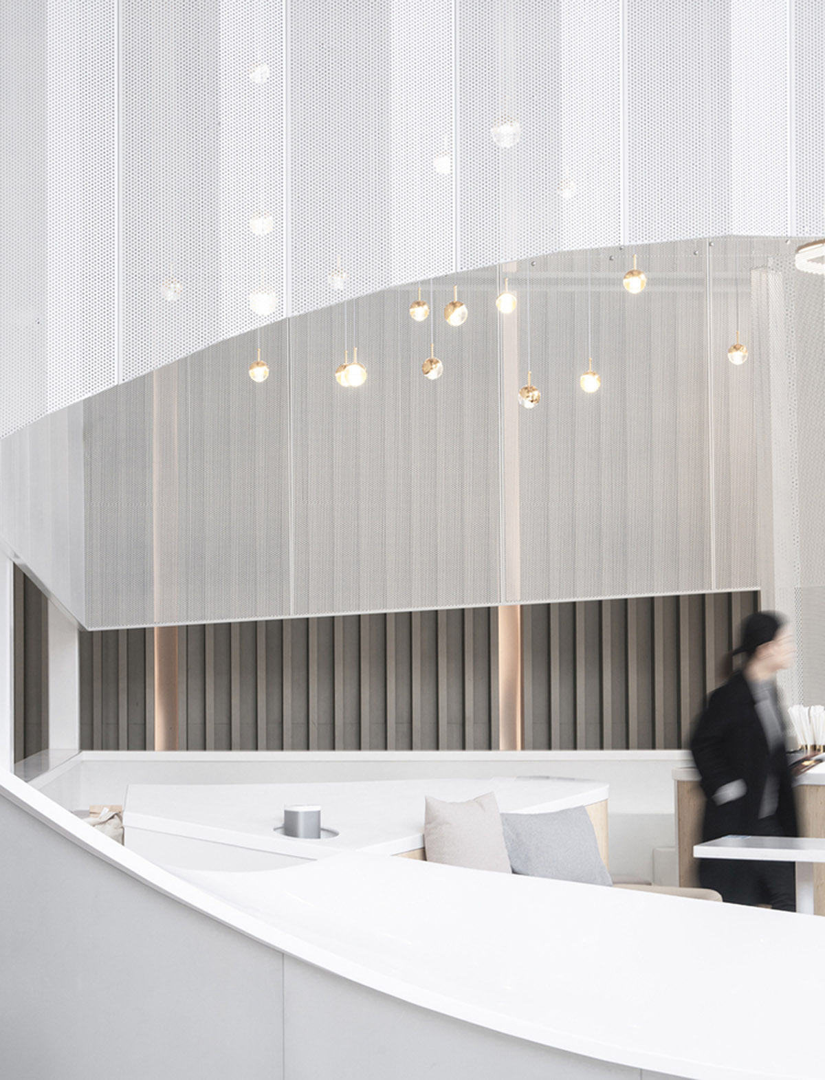 Mur Mur Lab uses all-white folded panels to create nature terrain for a coffee store in Shanghai