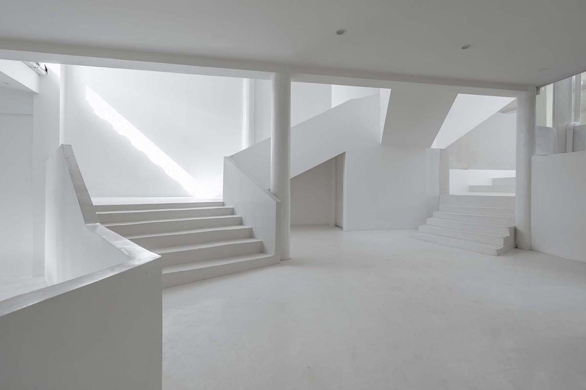 STUDIO QI reinterprets sequence of living conditions with tilted hotel on a hilly plot in China