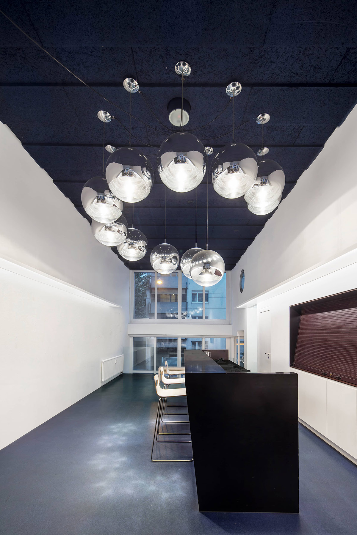 FOCKETYN DEL RIO Studio transforms an unused corridor of a building into a community center in Basel