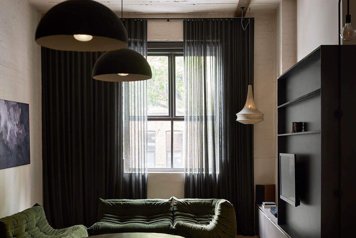 Splinter Society transforms former chocolate factory warehouse flat with earthy and rustic tones