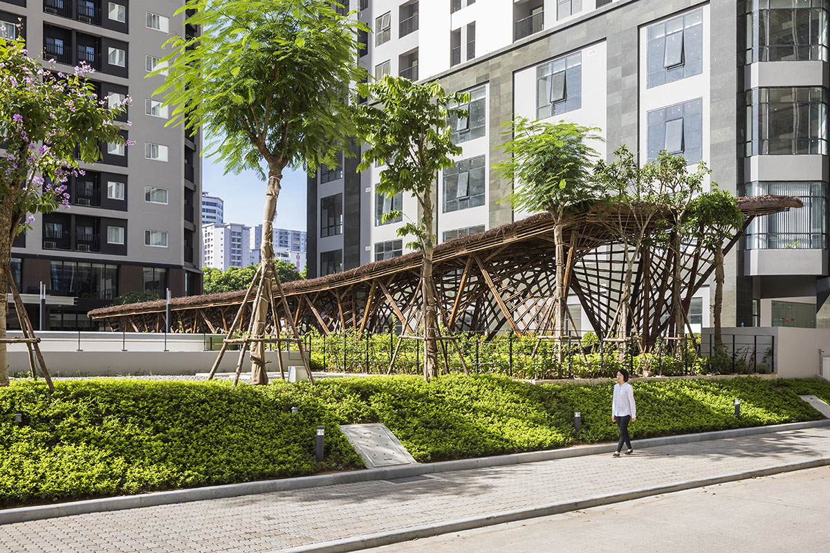 VTN Architects' Vinata Bamboo Pavilion creates a natural pathway in a garden of high-rise buildings