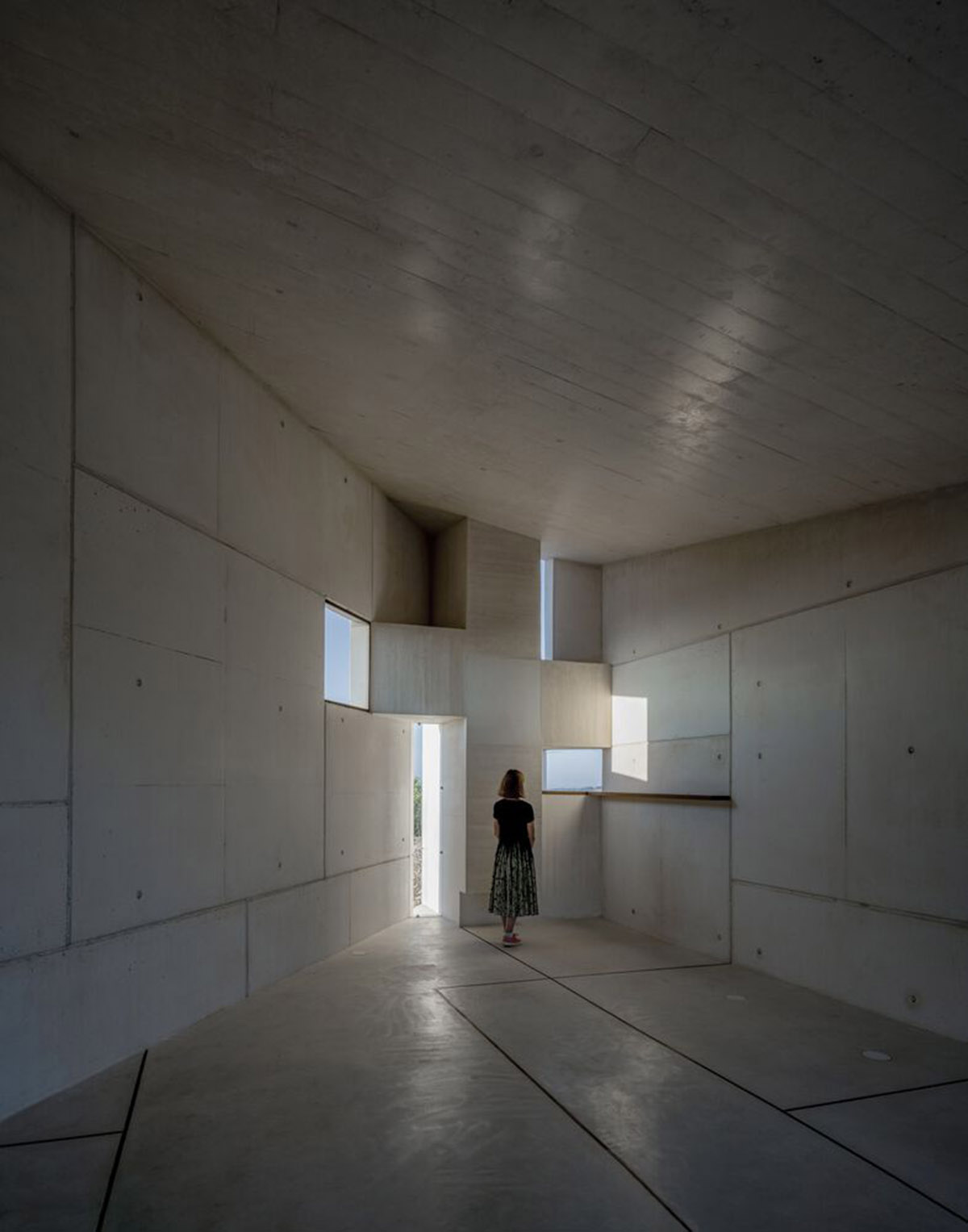 Folded concrete structure forms chapel in Spain designed by Sancho Madridejos