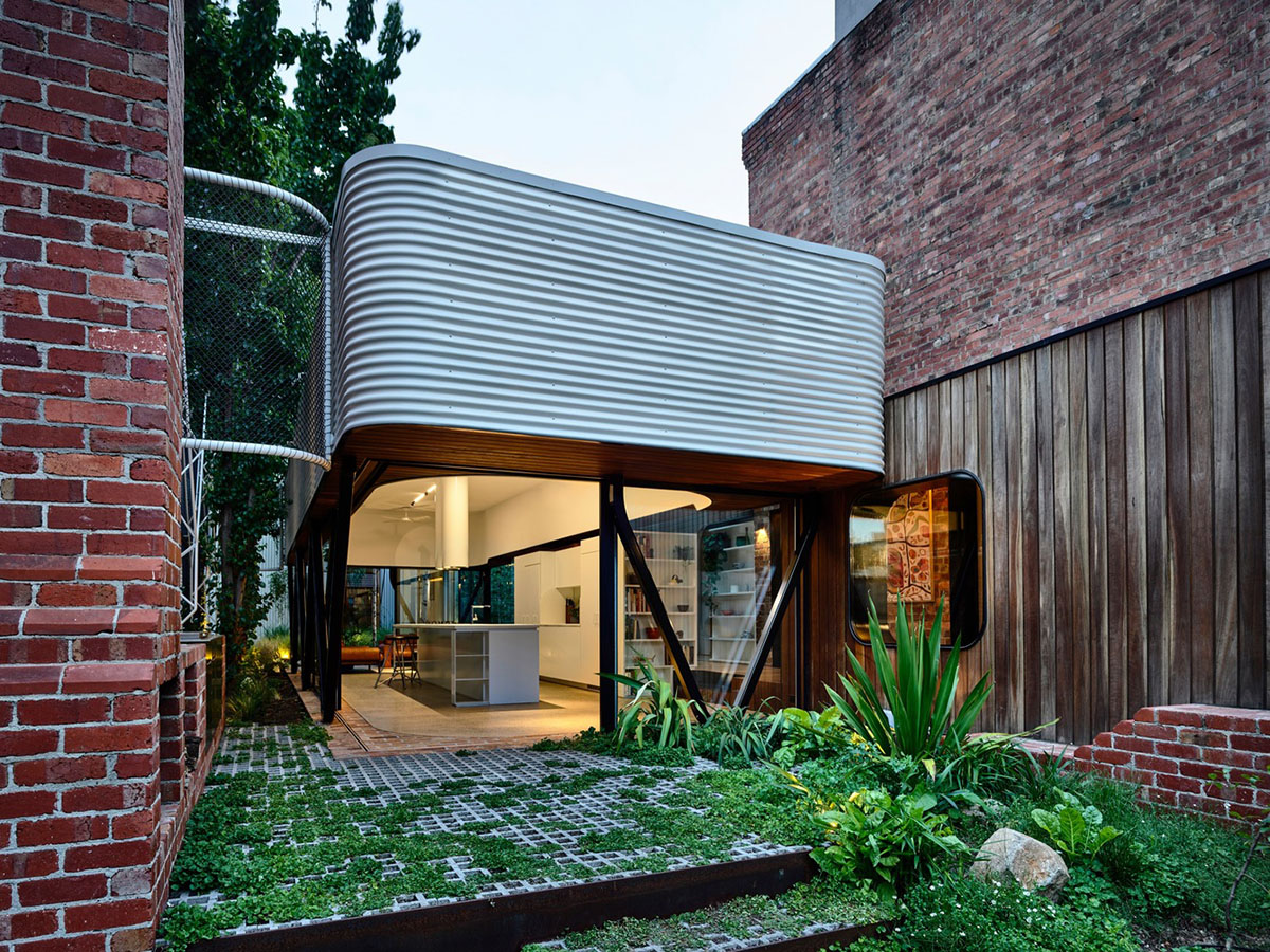 Austin Maynard Architects extends existing terraced home with corrugated steel pavilion