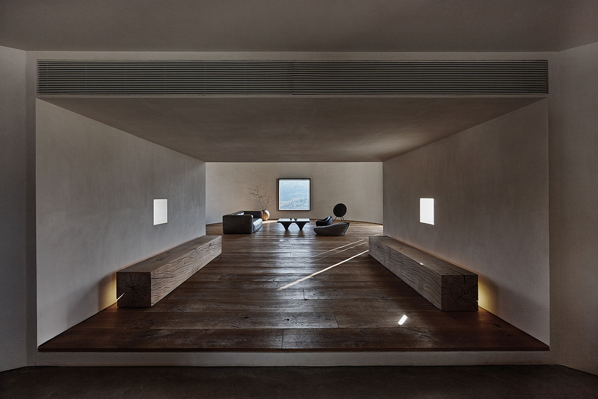 ZMY Design creates earth-toned interiors for a woodwork enthusiast’s house in Fujian, China