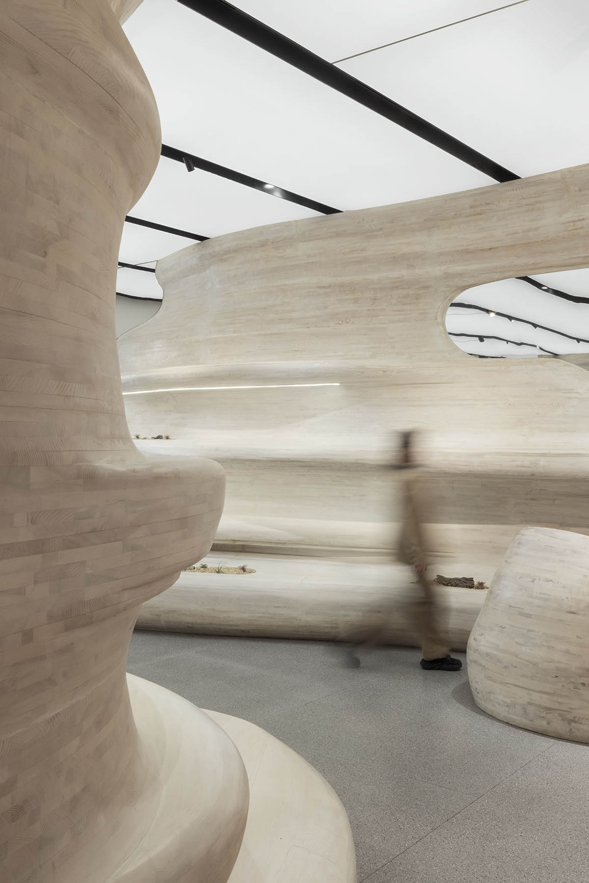 Interiors of Songmont Huaihai Road Store mimic wind-sculpted canyons in Shanghai