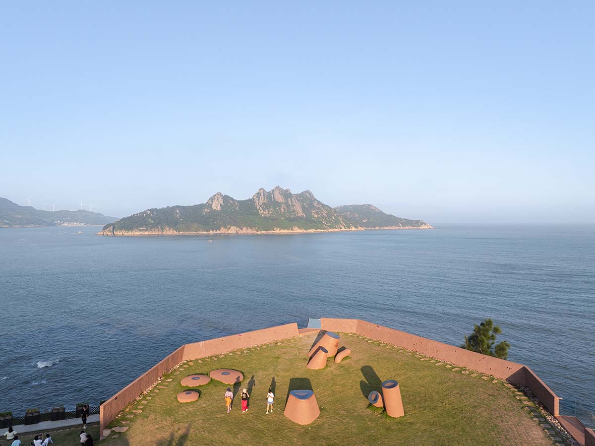 A gallery on a cliff features irregularly shaped lighting tubes that mimic marine creatures in China