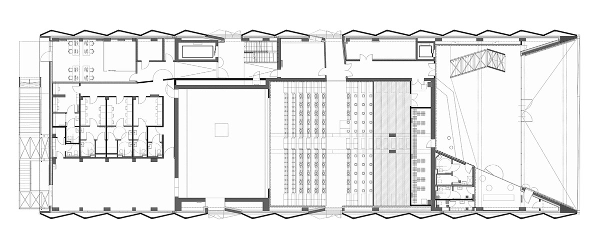 Teatro Borsoni theater is wrapped by façades that feature 3D-punctuated concrete blocks in Italy