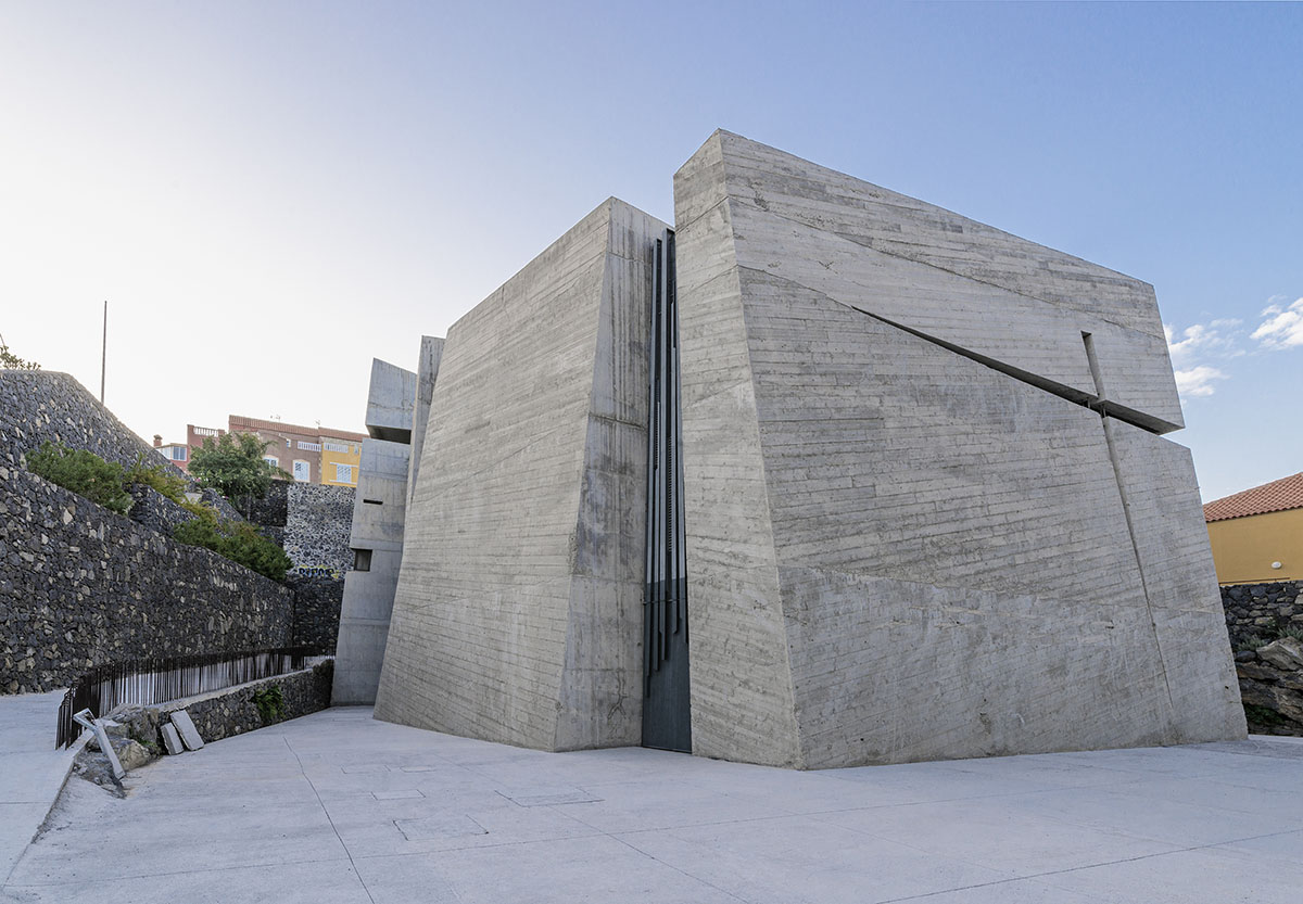 Menis Arquitectos designs church and community centre in Spain with four massive concrete volumes 