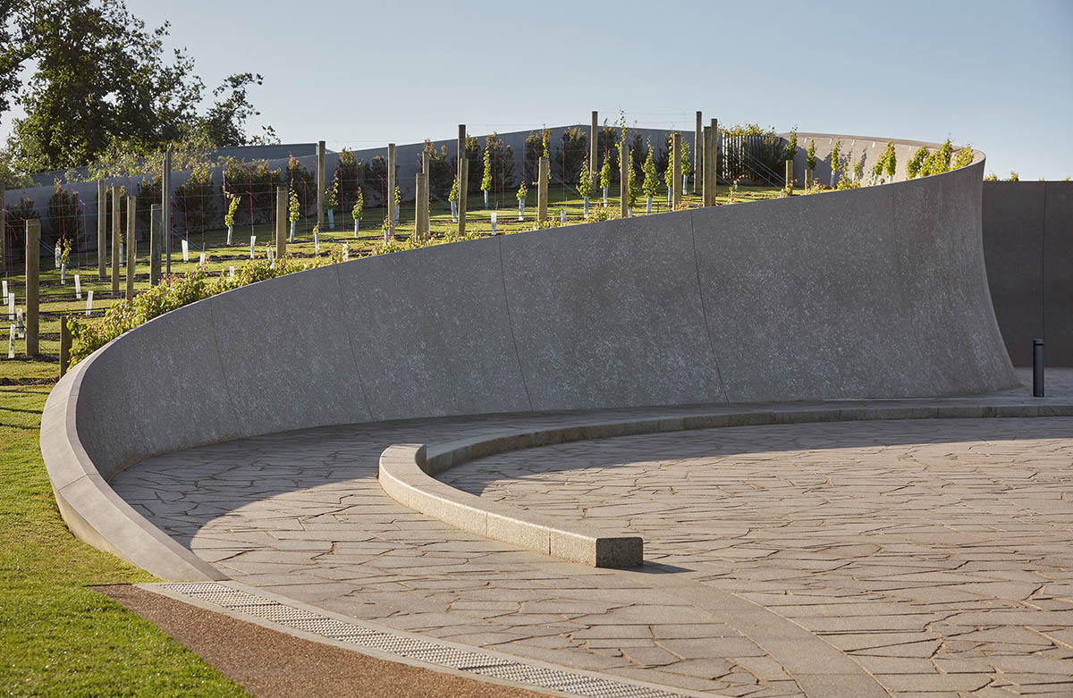 Jolson Architecture and Interiors completes Pt. Leo Estate Winery with sculptural walls in Australia