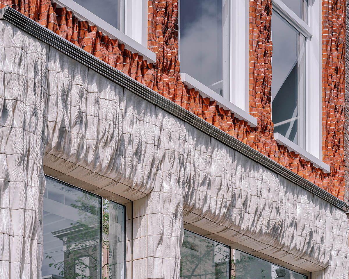 Studio RAP creates façade featuring bespoke 3D-printed ceramic tiles and bricks