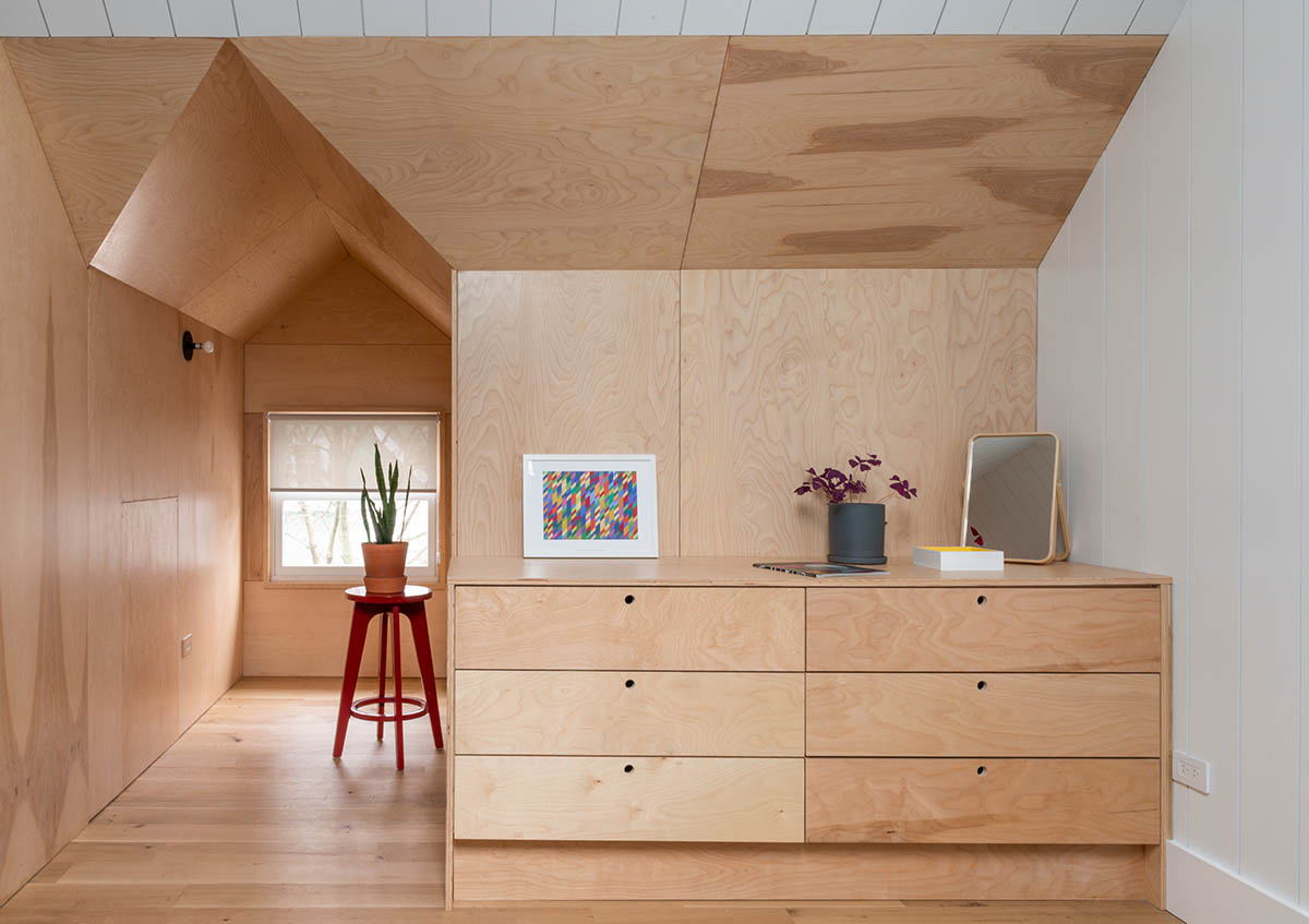 An attic for Ditmas House features colorful interiors designed by Shakespeare Gordon Studio