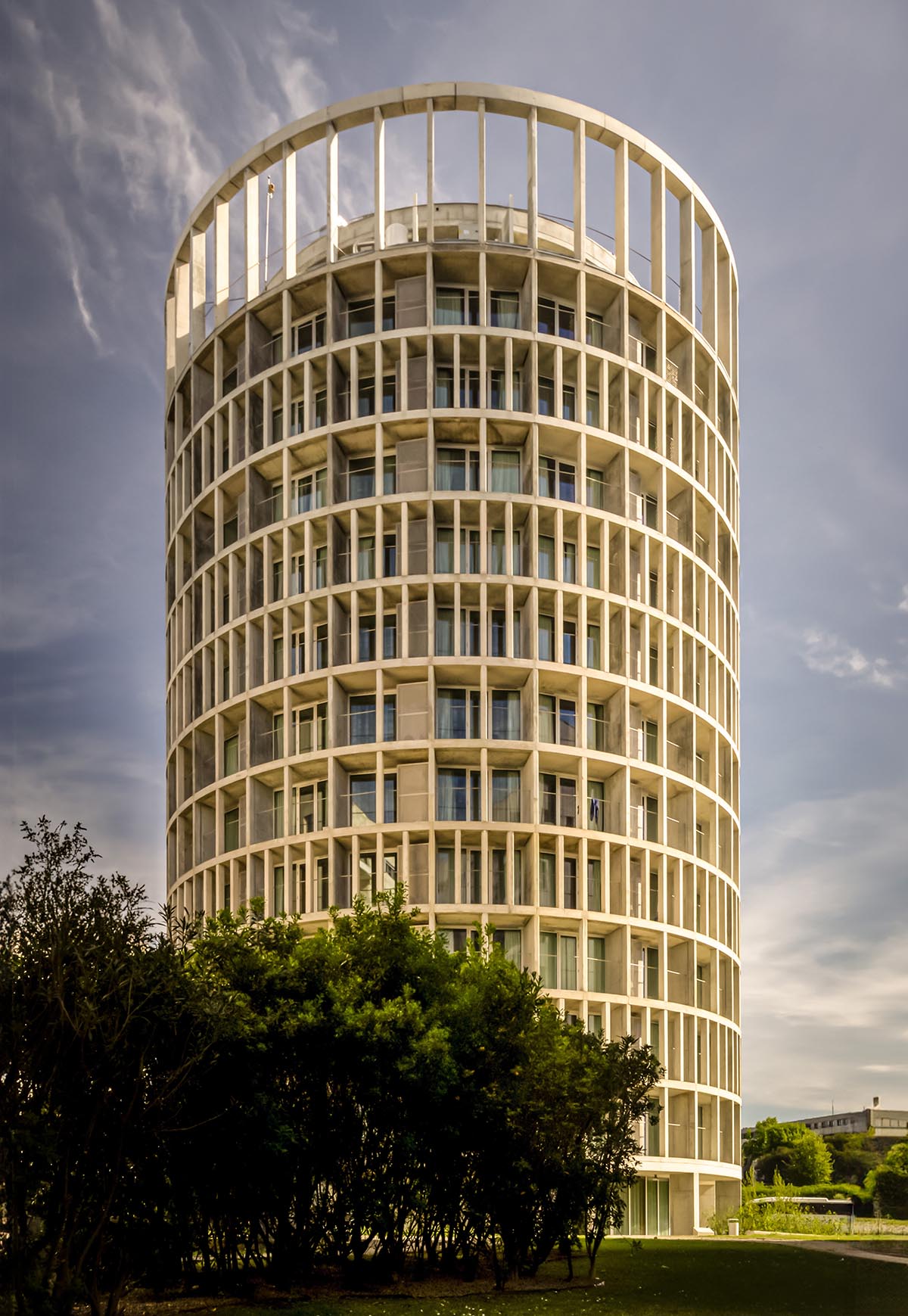 OODA completes cylindrical student housing with colonnaded skin in Porto, Portugal