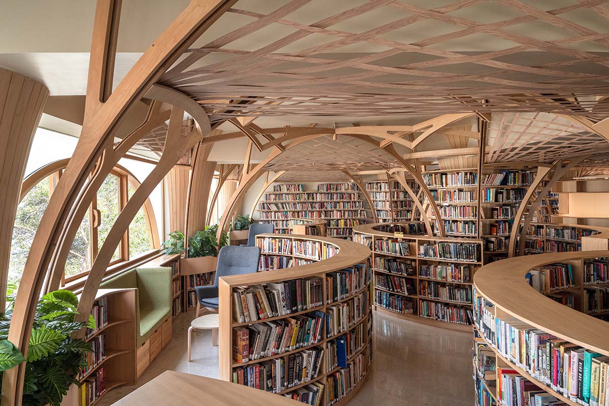 Studio Hinge embeds a library under the wooden tree-like canopies in Mumbai