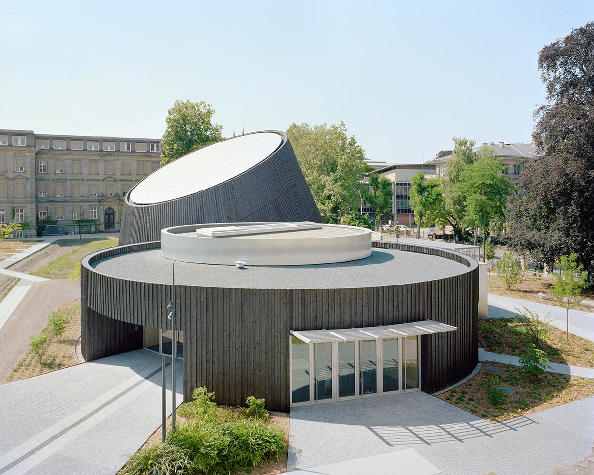 Planetarium clad in burnt wood at Université de Strasbourg evokes 19th century machine buildings