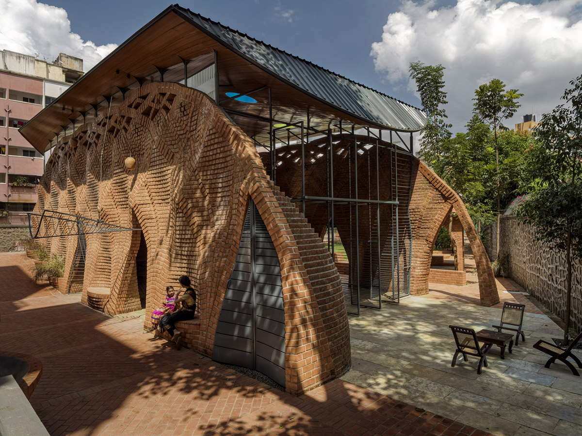 PMA madhushala's community center features undulating and artistic brick walls in Pune