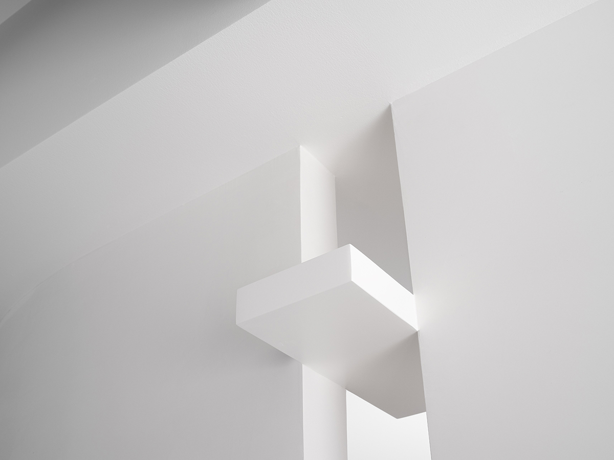 AD ARCHITECTURE creates all-white interiors with geometric compositions for L Apartment in China