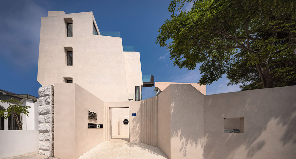 Oblique and hollow walls form this sculpted hotel by AT DESIGN in Southeast of Xiamen