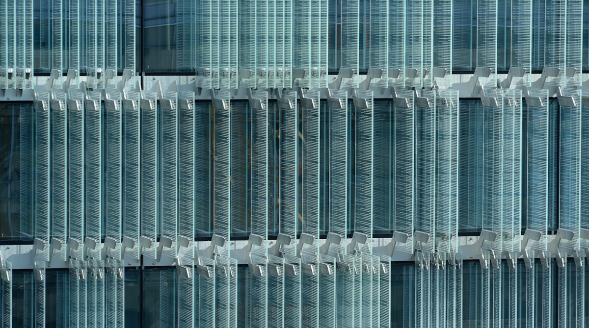 Giovanni Vaccarini wraps SPG Headquarters with countless glass fins, placed perpendicular to facade