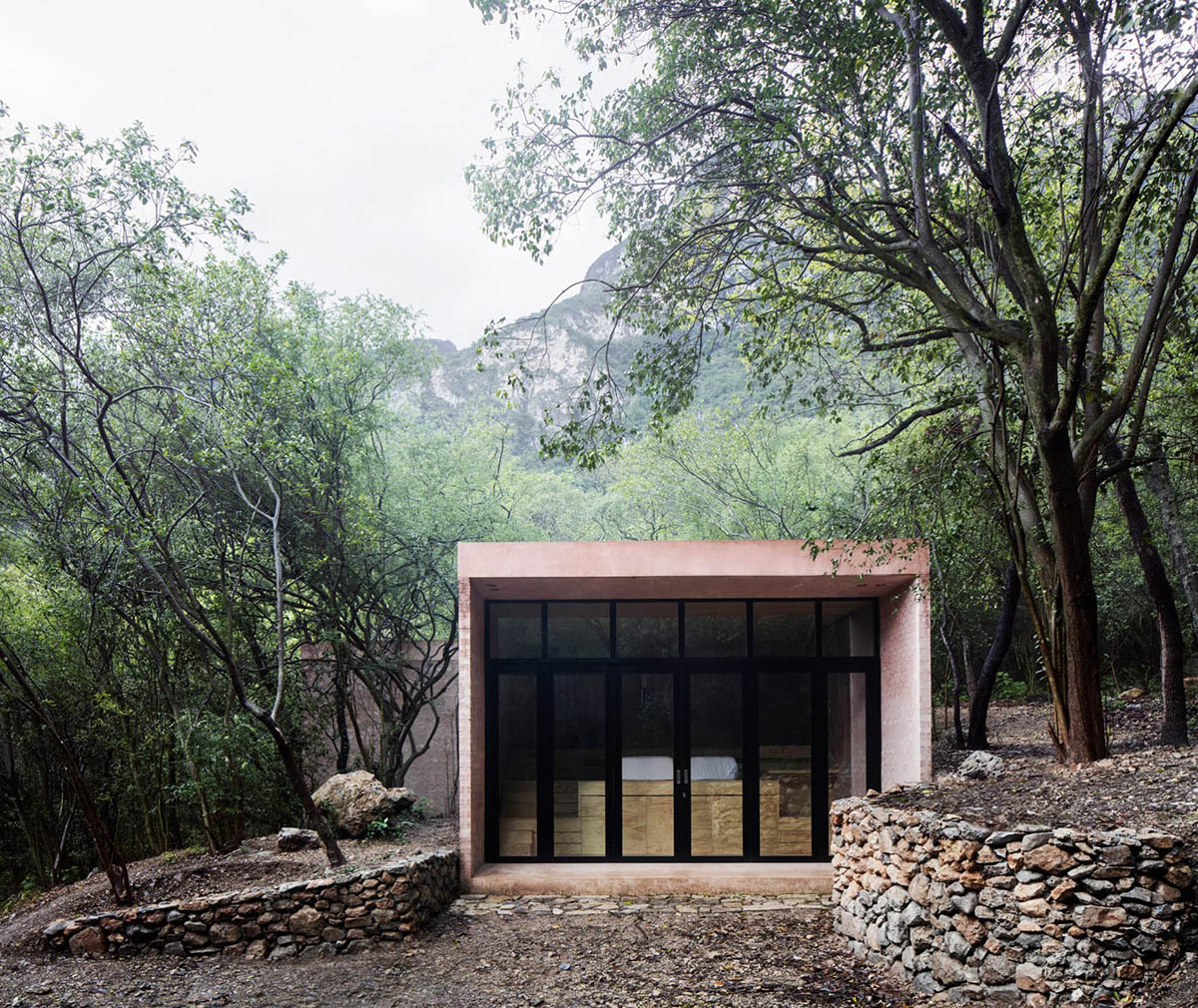 Tatiana Bilbao completes holiday dwelling that reflects its surrounding landscape with mirrored skin