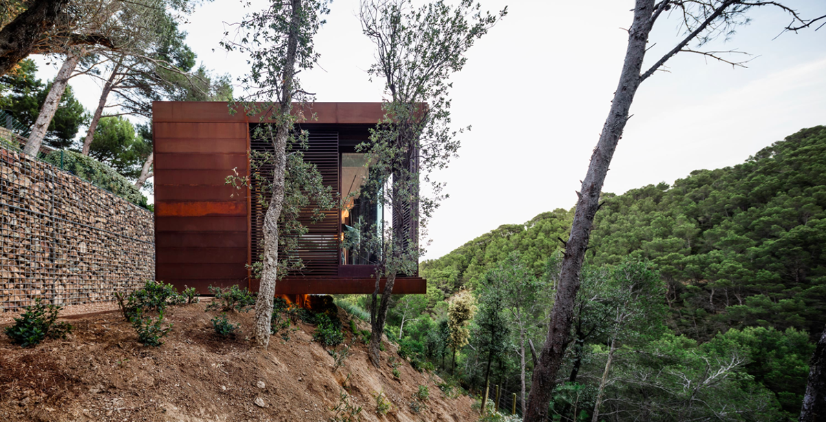 This Is Arquitectura completes corten steel Guest Pavilion in the middle of forest in Spain