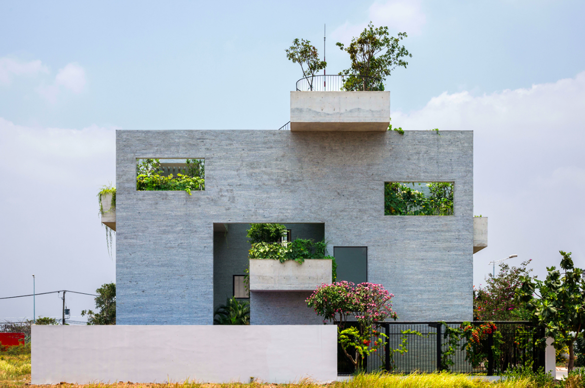 VTN Architects designed perforated house filled with gardens for Vietnam’s low density green spaces