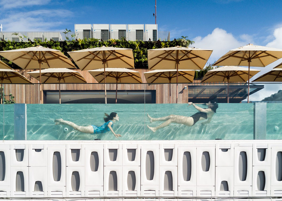 Oppenheim Architecture and Studio Arthur Casas' hotel features lacework-looking façade in Brazil