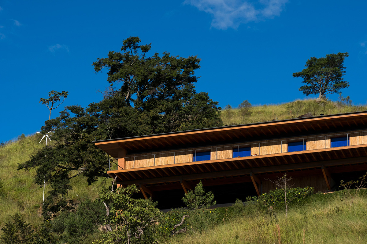 Narrow wooden Catu&ccedil;aba House by Studio MK27 produces its own energy on a valley of S&atilde;o Paulo