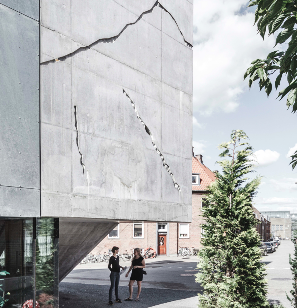 A collage of elements reflecting surroundings assembled on the facade of Office Building by SLETH