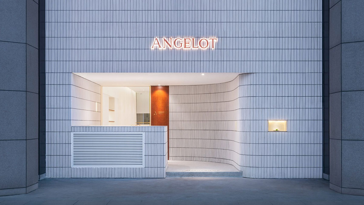 say architects uses curved tiled walls to merge exterior and interior for a patisserie in Hangzhou