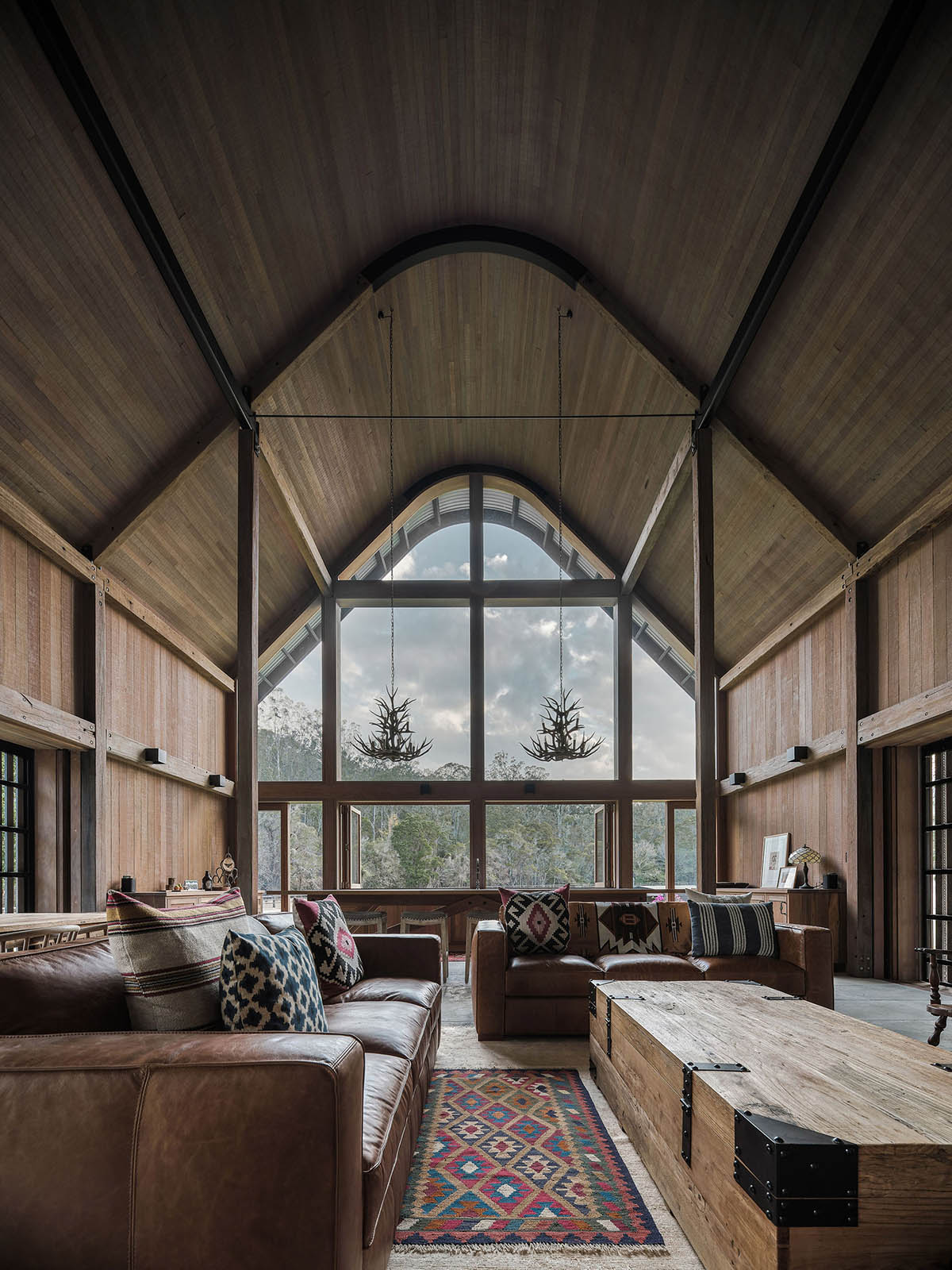 Paul Uhlmann Architects designs barn house featuring cathedral-like ceilings in Pullenvale