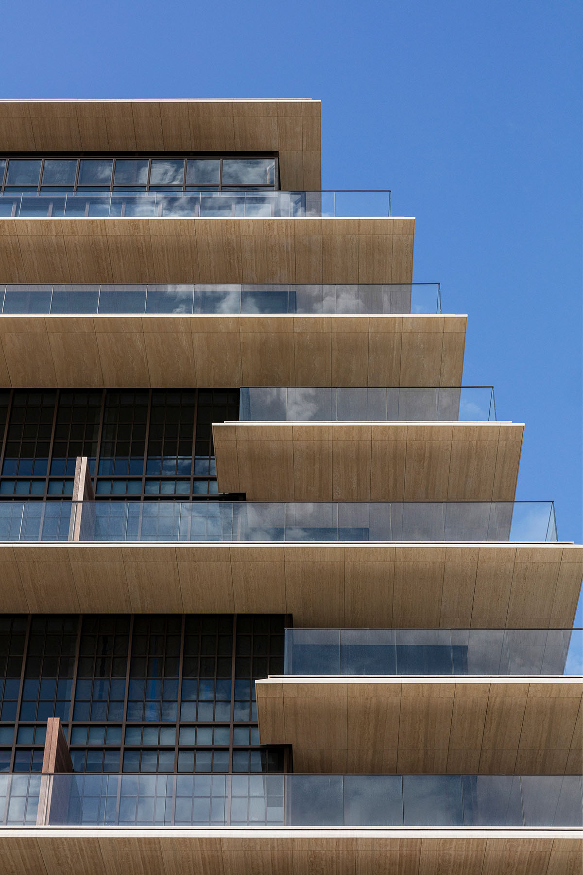 Antonio Citterio Patricia Viel built new condominium that features extruded horizontal terraces