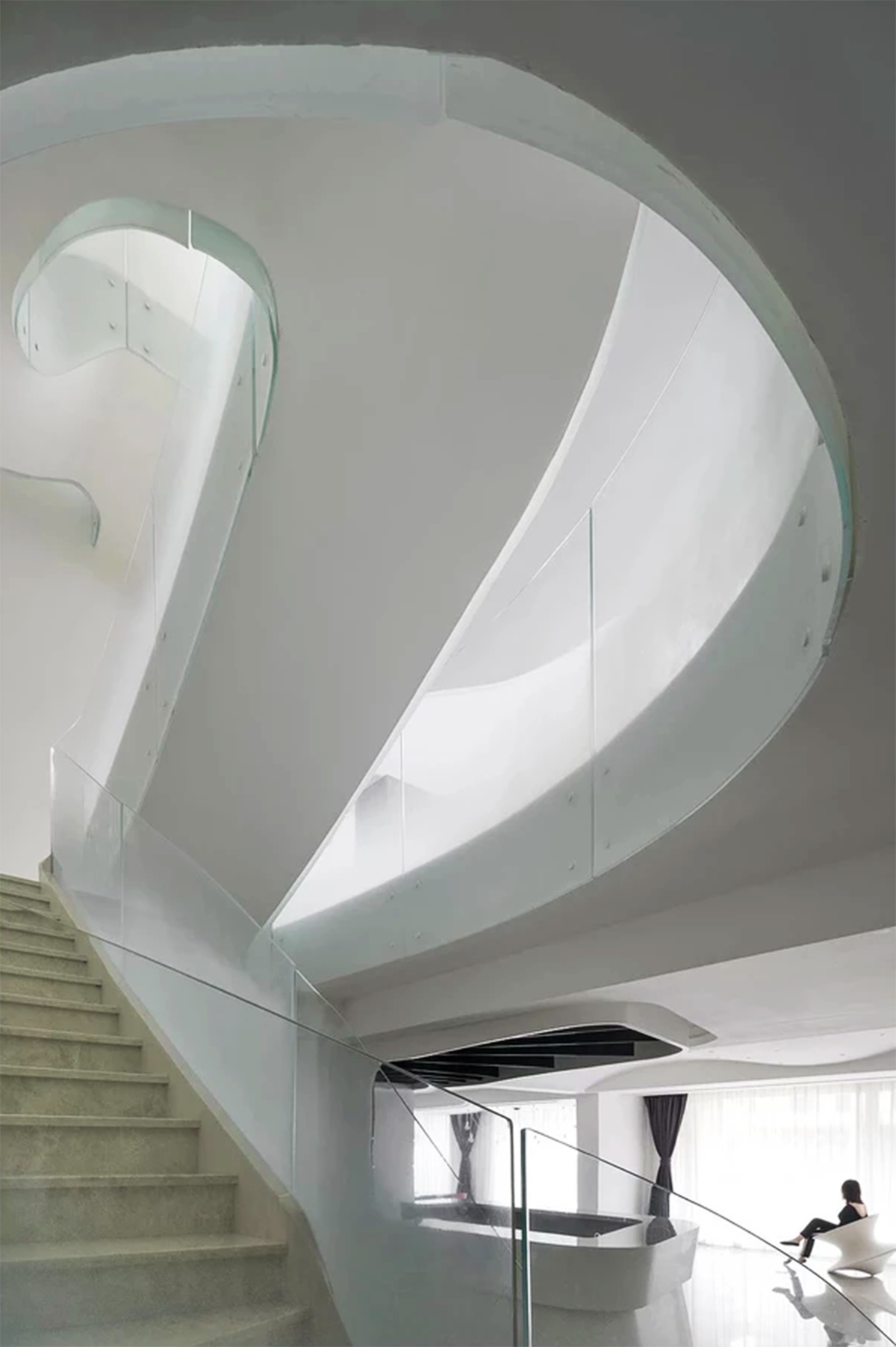 Grand spiral staircase dominates Cloud Villa in Shanghai by KOS Architects