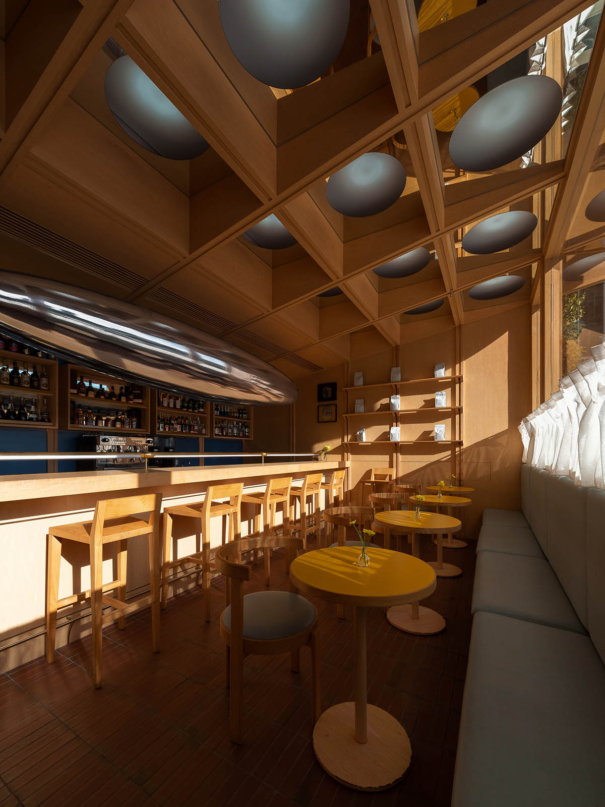 Various Associates completes C² Cafe & Bar in Shenzhen with wooden ceiling details