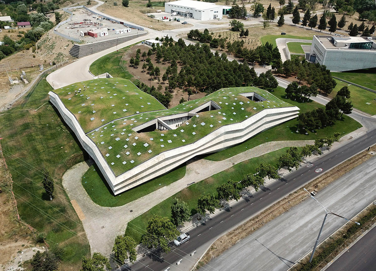 Folded concrete shell wraps coffee production plant by Giorgi Khmaladze Architects in Tbilisi