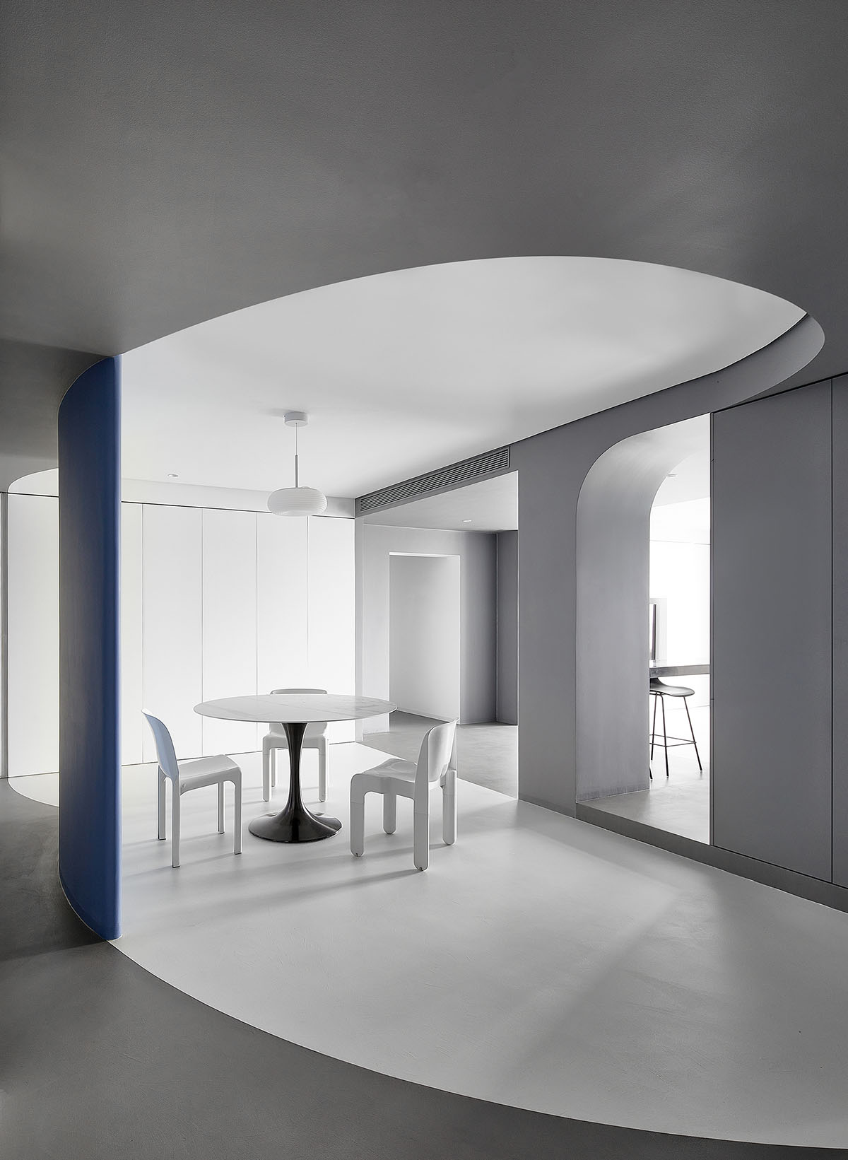 XIGO STUDIO creates gray and blue-colored interiors for apartment in Beijing 