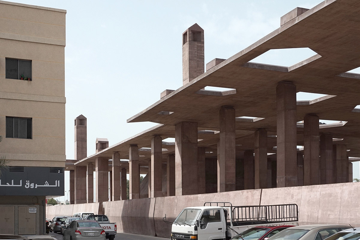 Valerio Olgiati designs monolithic entrance with forest of Valerio Olgiati designs monolithic entrance with forest of
