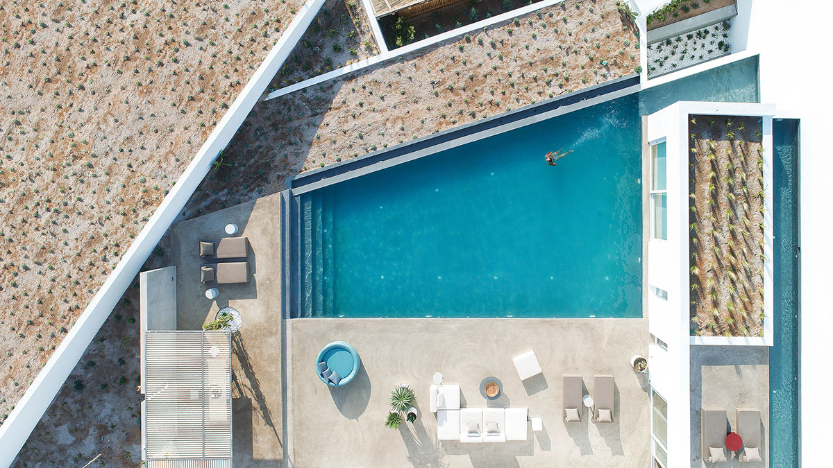 Kapsimalis Architects adds this summer villa featuring orthogonal lines to the Santorini Island