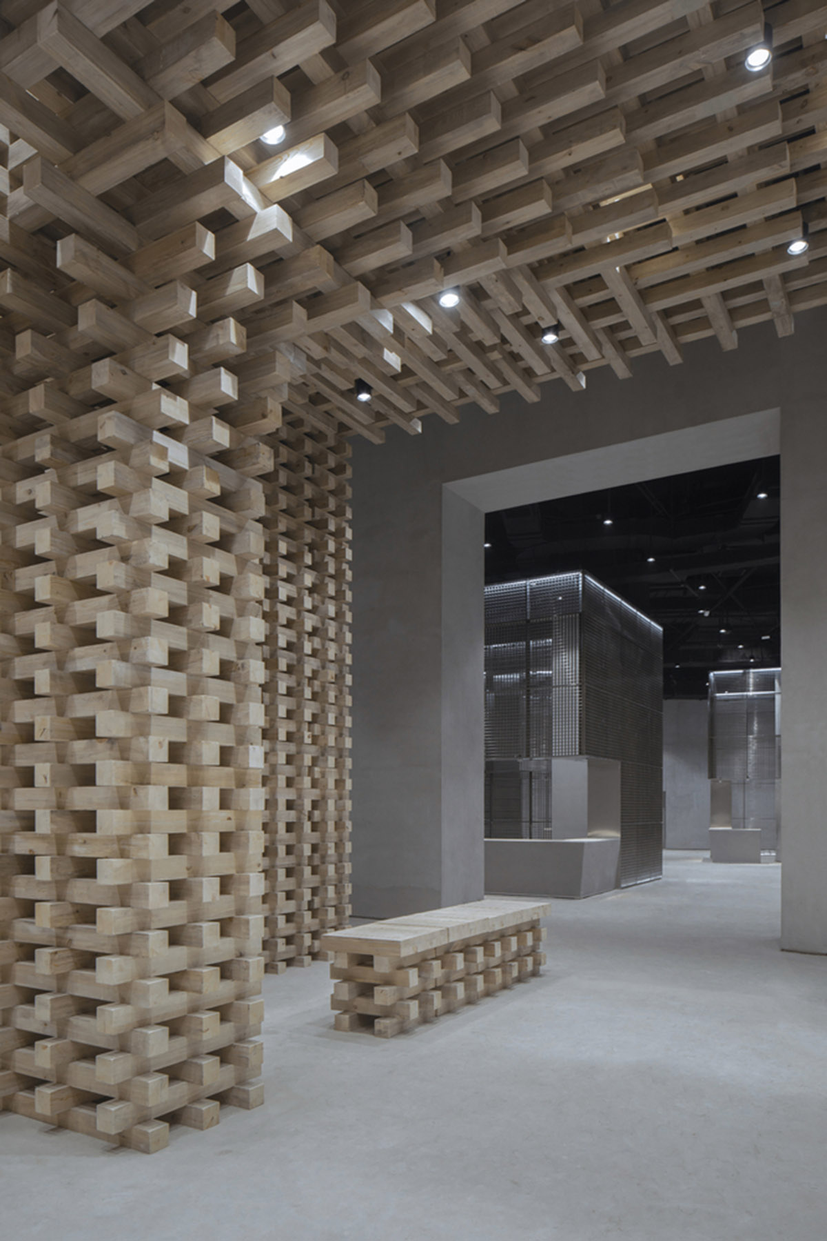 BANDe Architects combines greyscale interior with gridded wooden structures for GreenMonster Lab