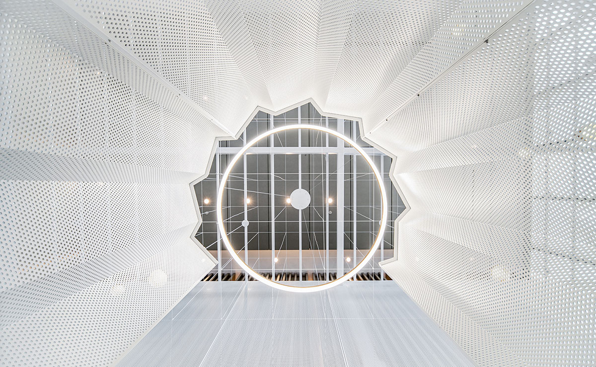 Mur Mur Lab uses all-white folded panels to create nature terrain for a coffee store in Shanghai