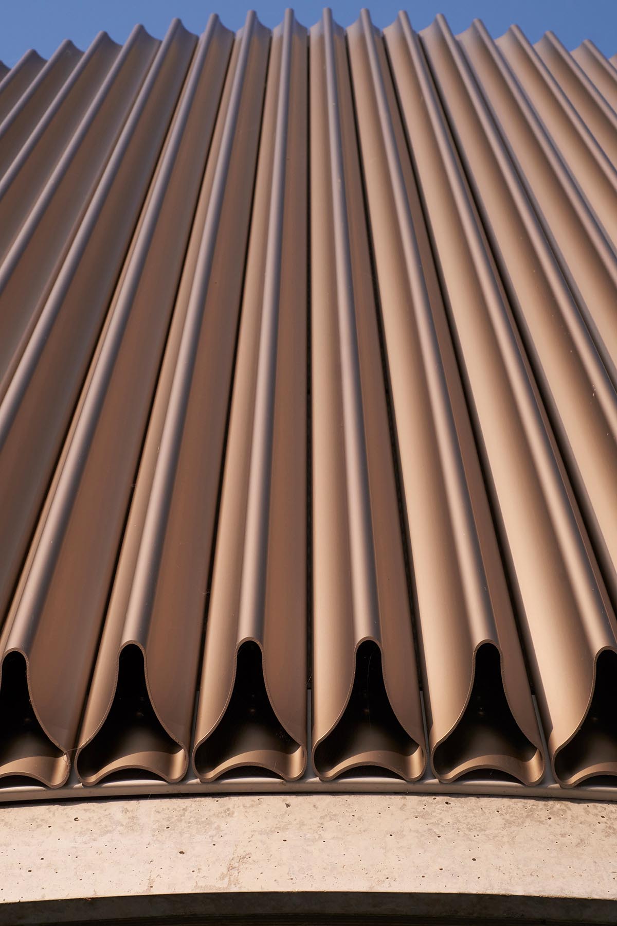 Elegant details and trefoil-shaped garden form this family house by Eldridge London in Coombe Park