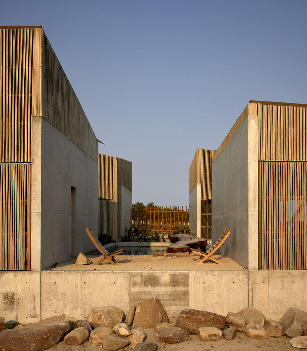 Four concrete and wooden volumes form Casa Naila paying tribute to Oaxaca’s rural architecture