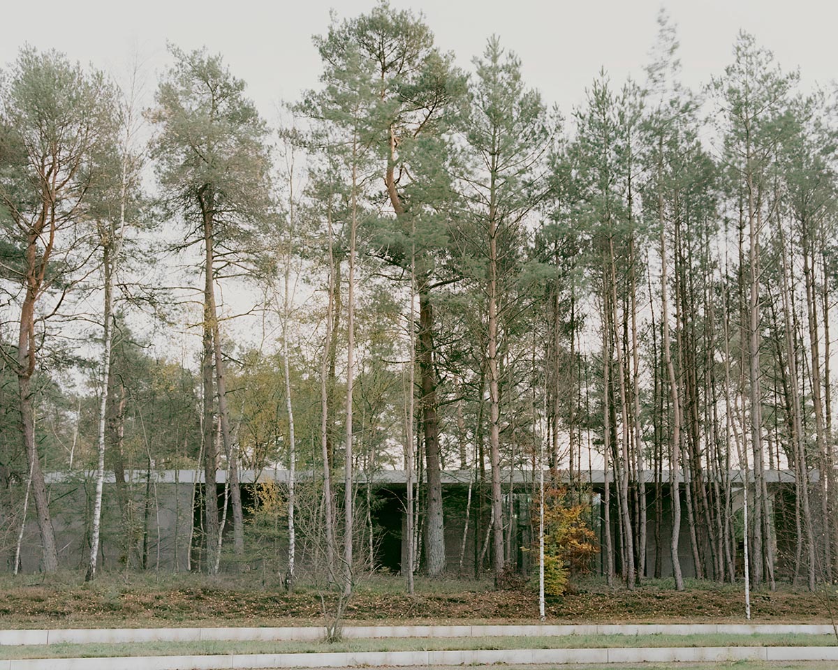 KAAN Architecten built serene Loenen Pavilion commemorating Dutch victims among pine trees