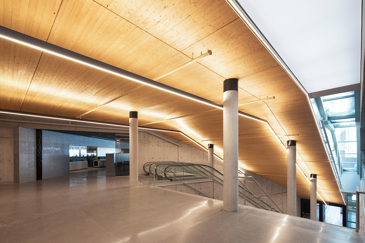A striking bell tower pierces the sky, illuminating the grandeur of the pavilion in Montreal