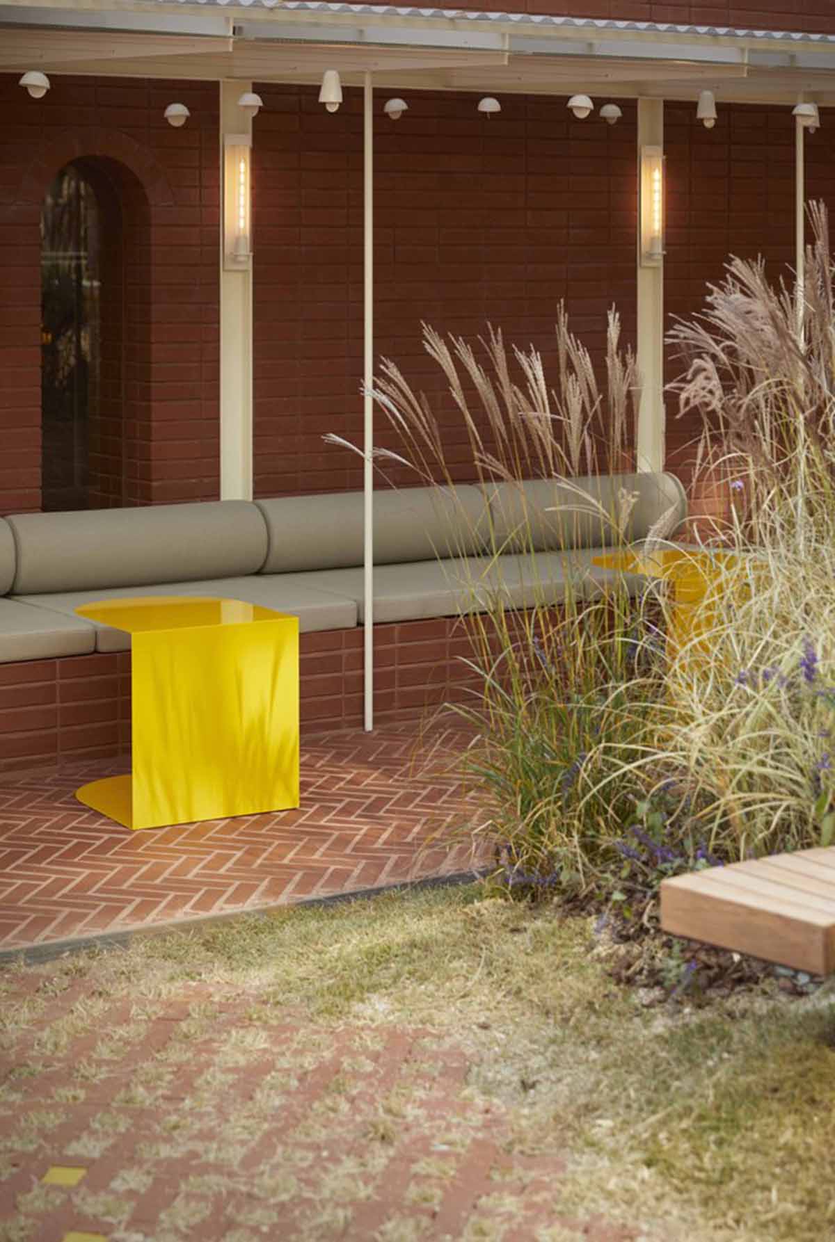 Roly-Poly Cotto restaurant fills in between historic buildings with its cave-like red brick facade