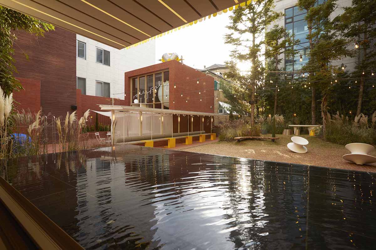 Roly-Poly Cotto restaurant fills in between historic buildings with its cave-like red brick facade