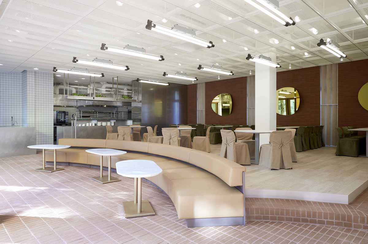 Roly-Poly Cotto restaurant fills in between historic buildings with its cave-like red brick facade