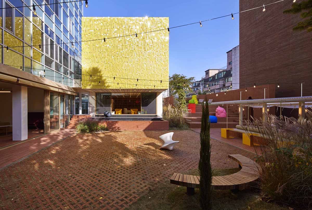 Roly-Poly Cotto restaurant fills in between historic buildings with its cave-like red brick facade