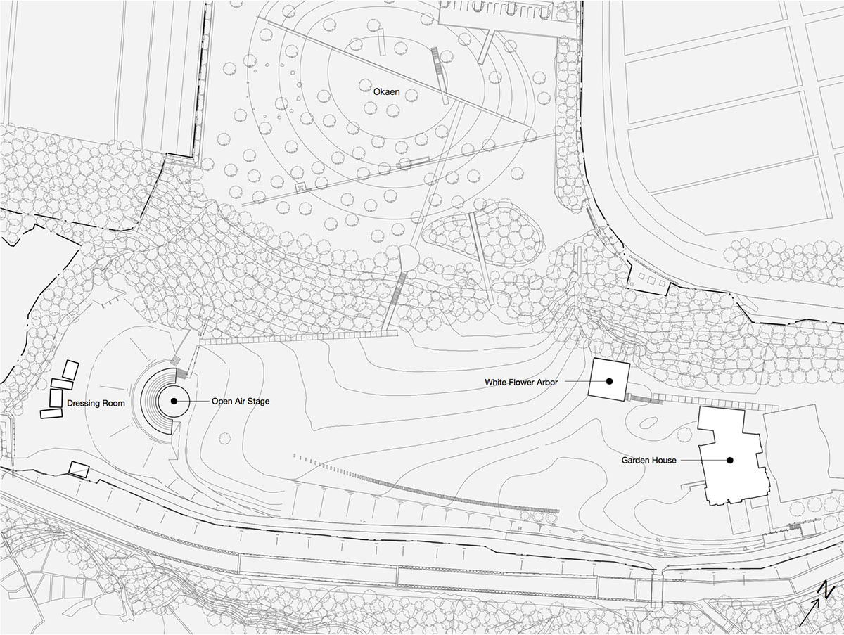 A multi-purpose venue is wrapped by living trees as an addition to open-air theatre in Japan
