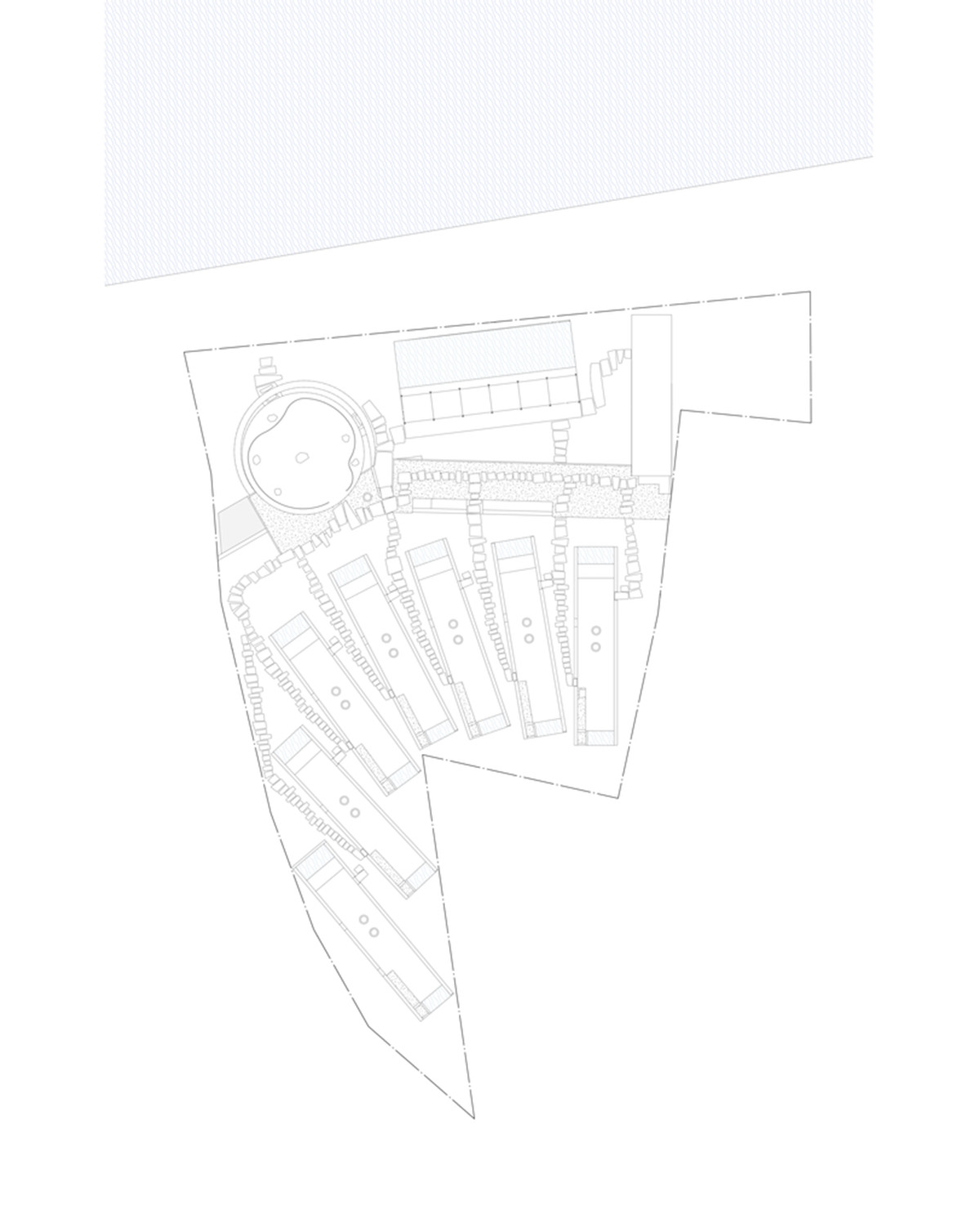 Linear concrete walls hide hotel rooms overlooking lush forest on the northern coast of Bali